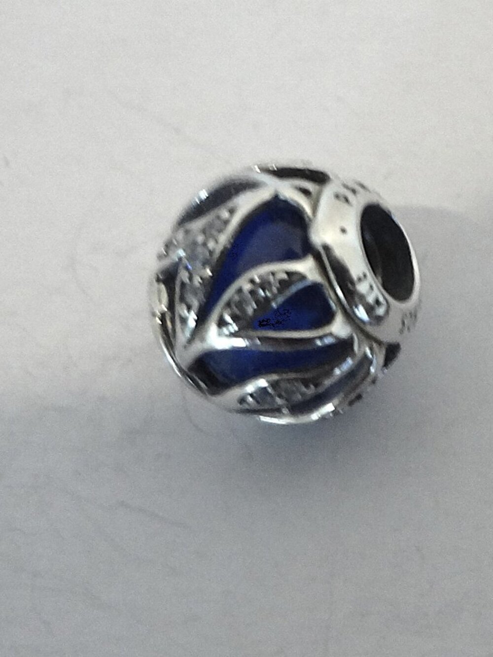 Silver Round with Blue Bead